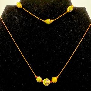 N215 gold tone, necklace, and bracelet with painted green beads